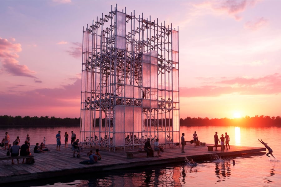 En la imagen aparece la estructura con la que el académico Usach participa en Berlín. La estructura está en un pequeño embarcadero y gente a su alrededor, mientras el sol comienza a caer en el horizonte.